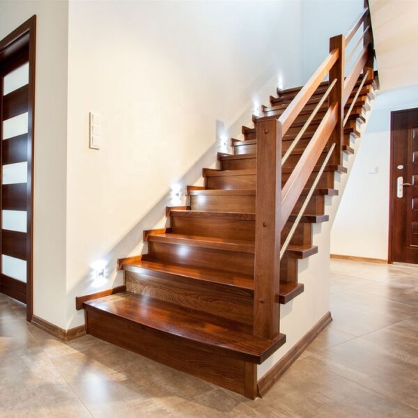 Modern wooden staircase with stylish lighting